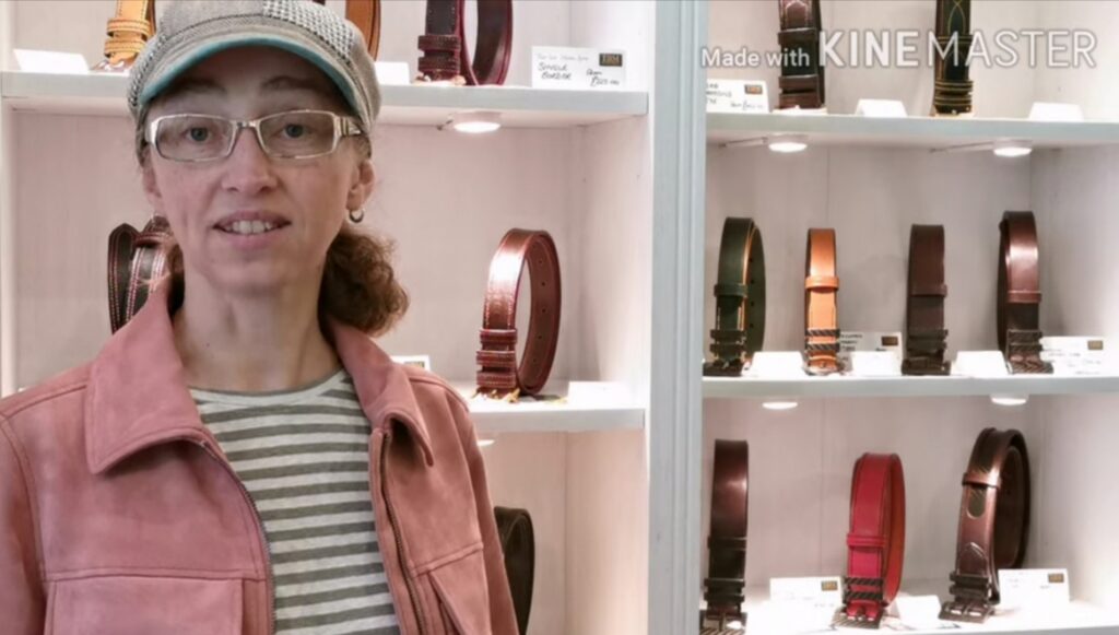 Marie in front of some belt shelves