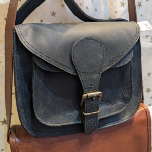 Black Curved Saddle Bag by Paper High Fair Trade